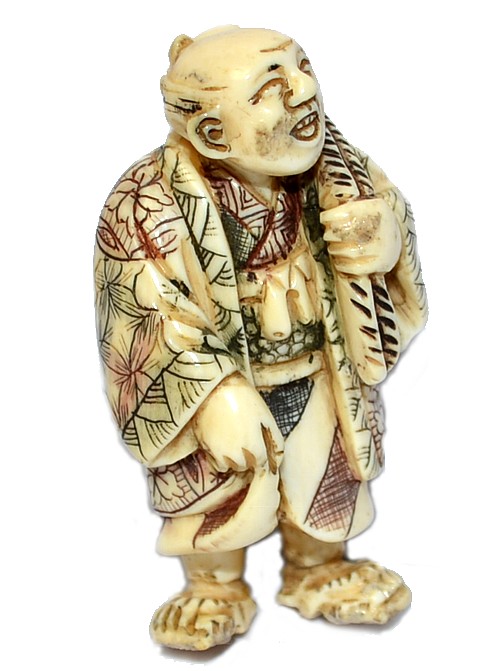 японская нецка из слоновой кости Мужчина с зонтиком за спиной